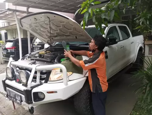 ganti aki mobil isuzu mux